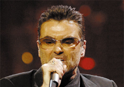 Wham! It’s George Michael the taverna star… or is it? George Michael in concert - London