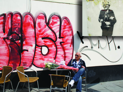 ‘Make tea not war’ mural tribute to shopkeeper ruined by graffiti vandals – debate opens into preserving street art news042111_09