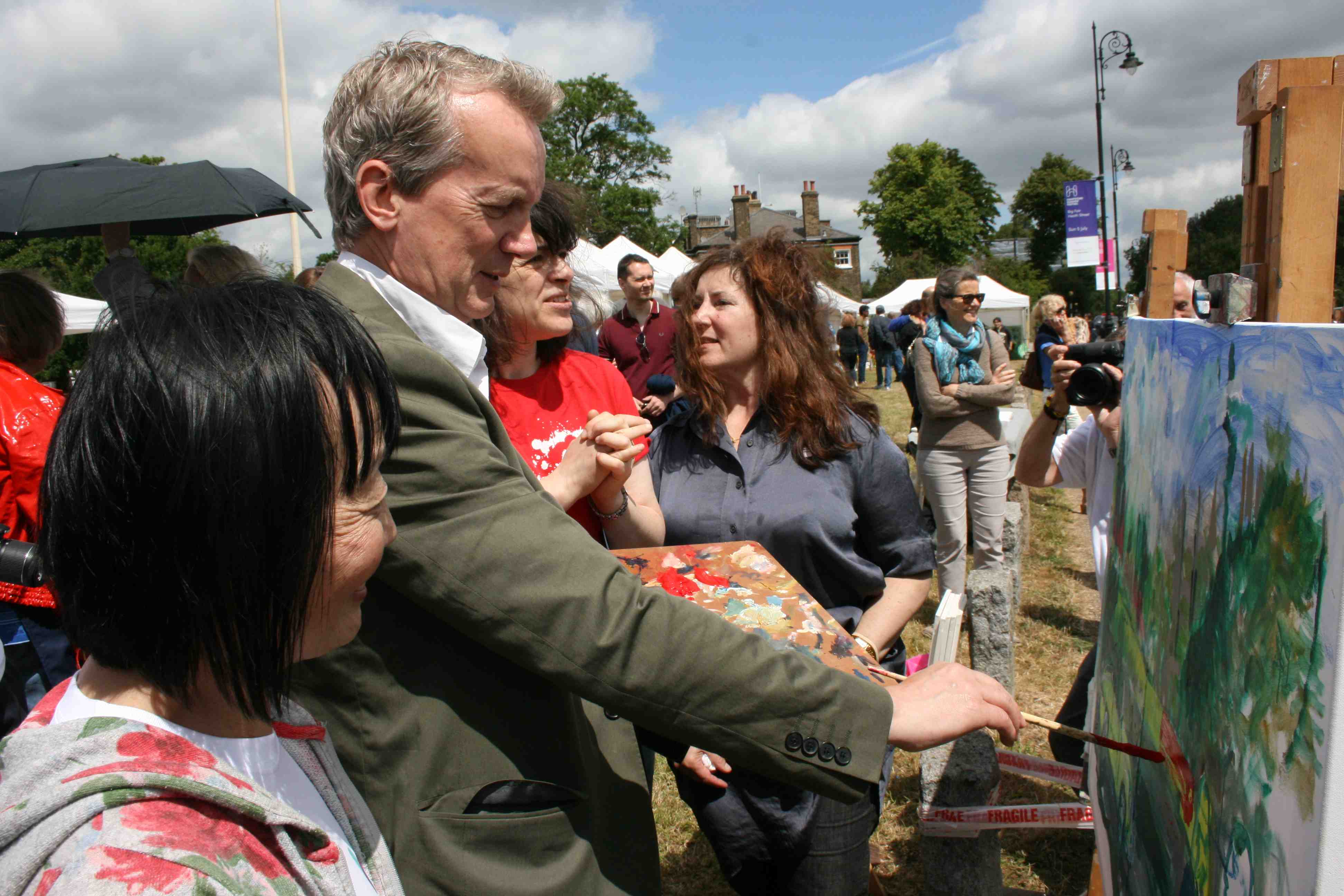 Frank Skinner tries his hand at painting during art day at Whitestone