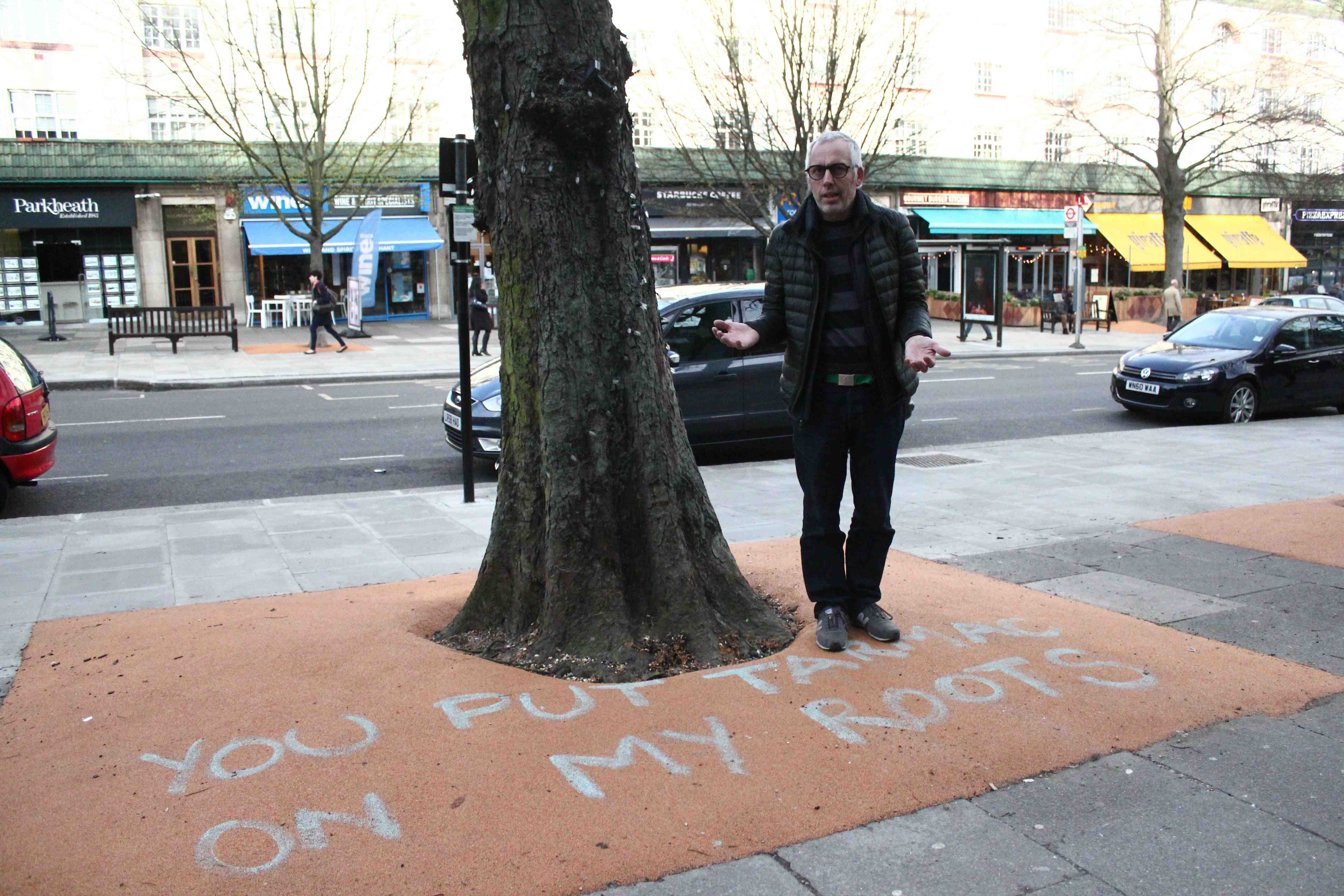 Red faces over orange pavement: Council botch job as tree roots are covered in tangerine tarmac IMG_0752