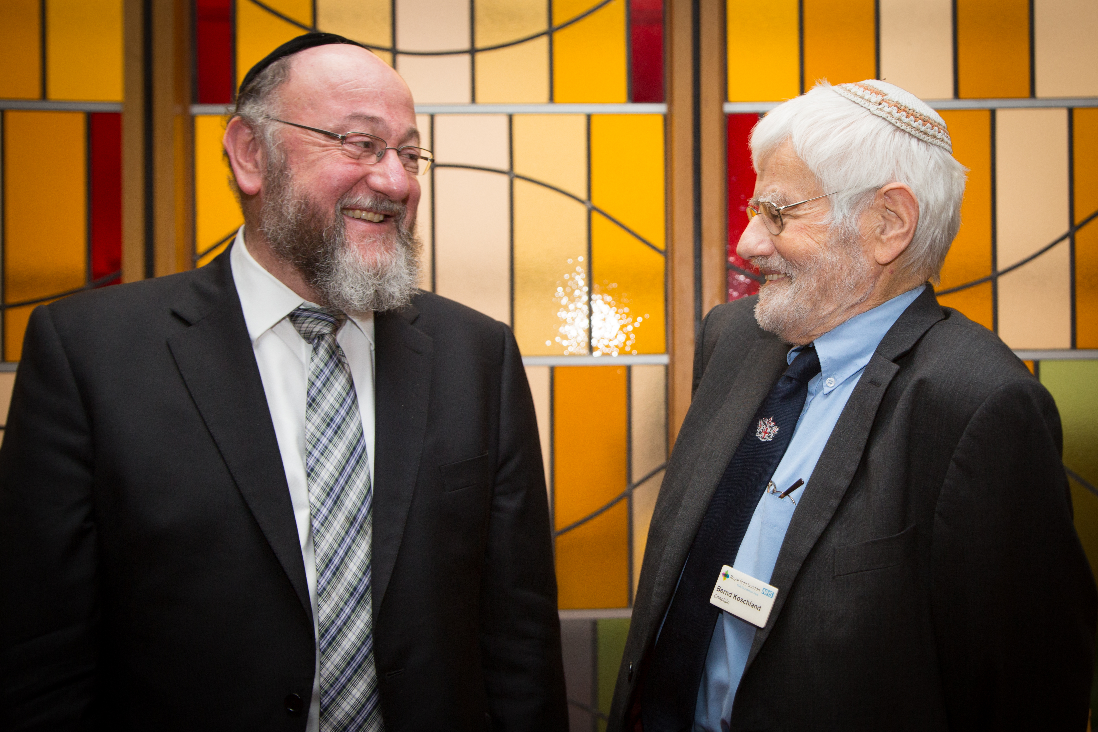 Bernd Koschland (right) at his retirement party with Chief Rabbi, Ephraim Mirvis