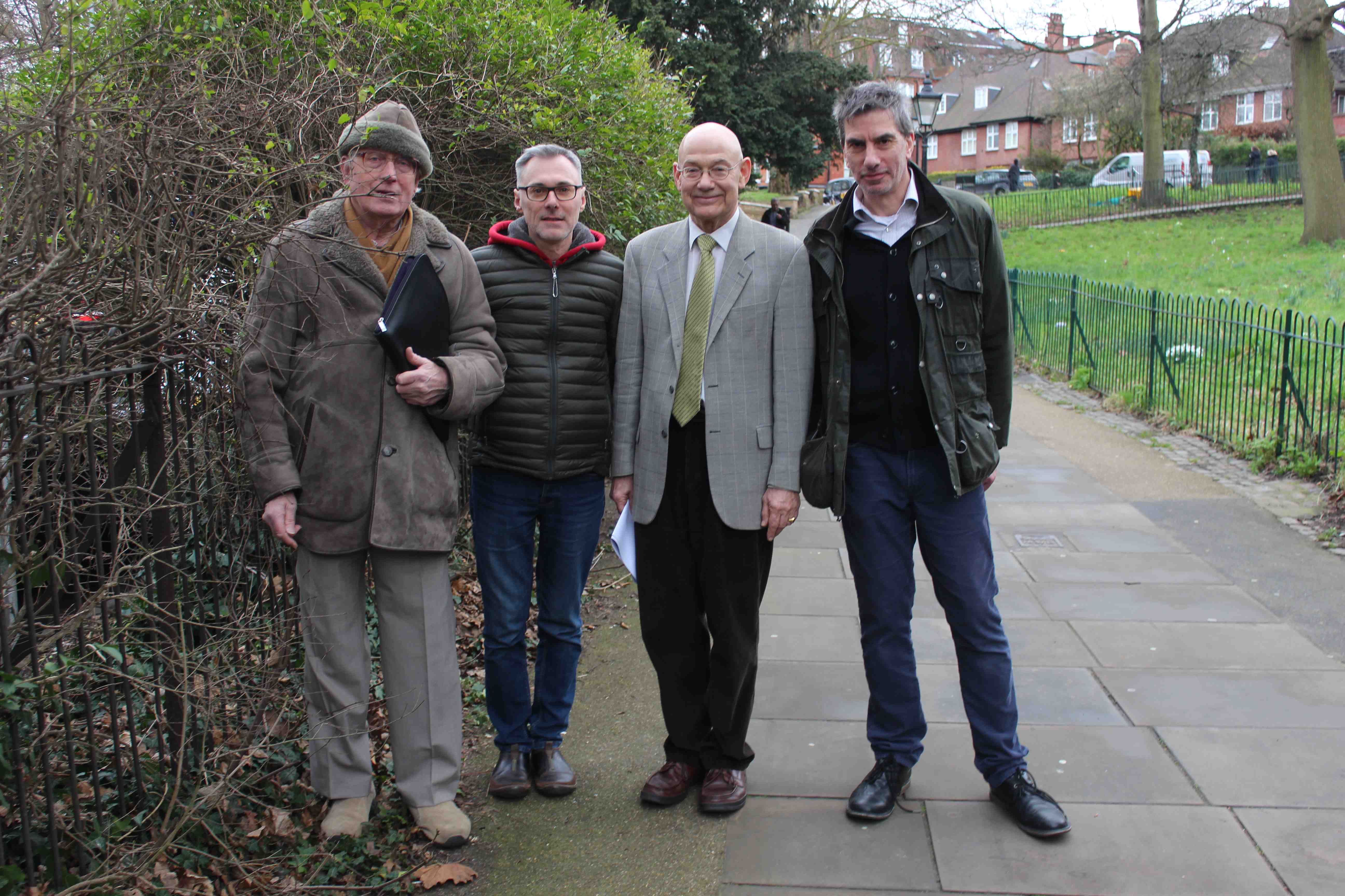 Save Our Path: Short cut next to Royal Free to be narrowed St Stephen’s Church Trust chairman Michael Taylor, Milan Selj, Peter Davey and Hampstead ward Councillor Stephen Stark pose with a tape measure that shows the distance the path will be reduced by