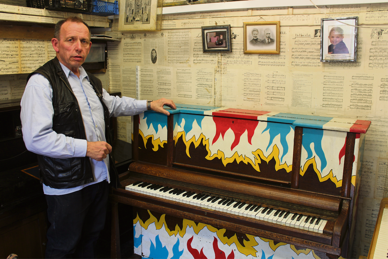 Flaming piano saved from blaze at market firepiano