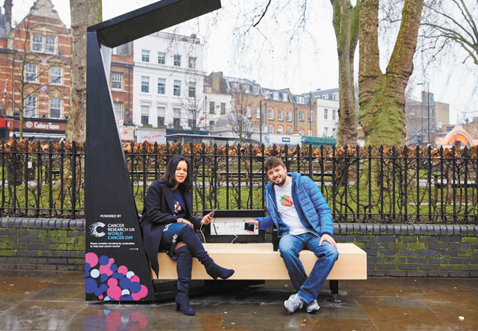Tech firm stands up for ‘smart benches’ opposed by conservation group Cllr Claudia Webbe on Smart bench - CREDIT CANCER RESEARCH