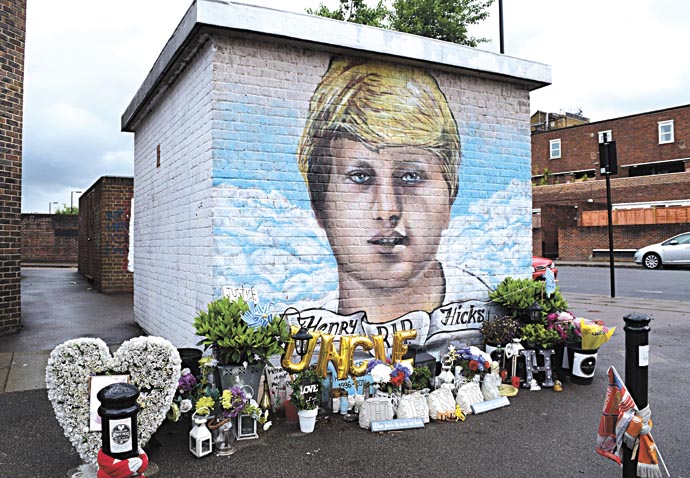 Police blame ‘shock’ for their two versions of Hicks pursuit Henry Hicks_floral tributes_mural