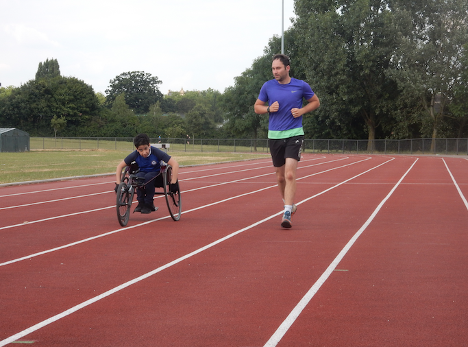 Left: coach Anthony Norris with para-athlete Ilias Zghoundi