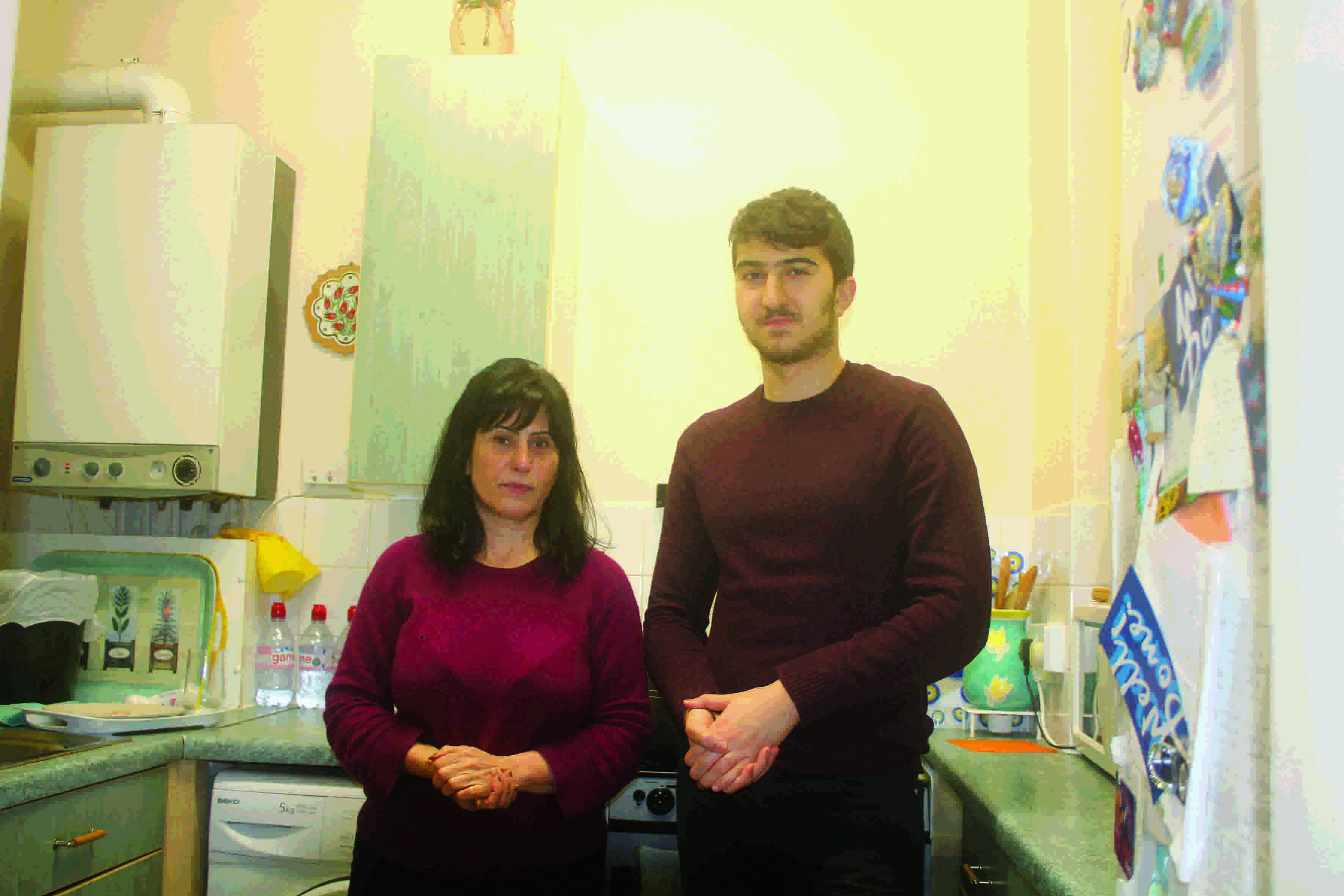 ‘My damp flat brings back memories of Iraq’ 06-Sharmin and son Daryan Baker