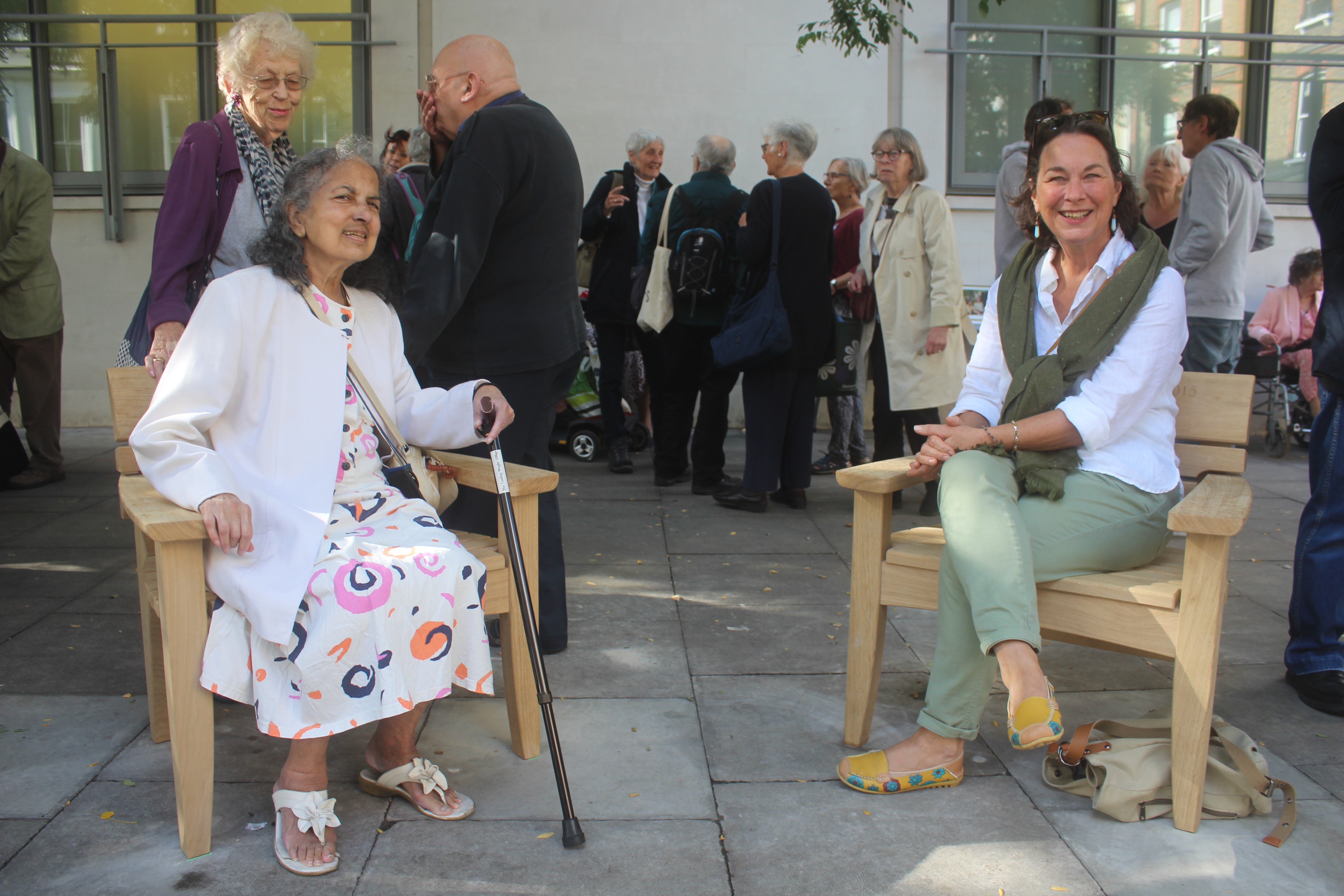 Wooden armchairs remember ‘honourable’ Holborn councillor Shaku Woodrow, left, and Cllr Sue Vincent sit in the armchairs in memory of Brian Woodrow