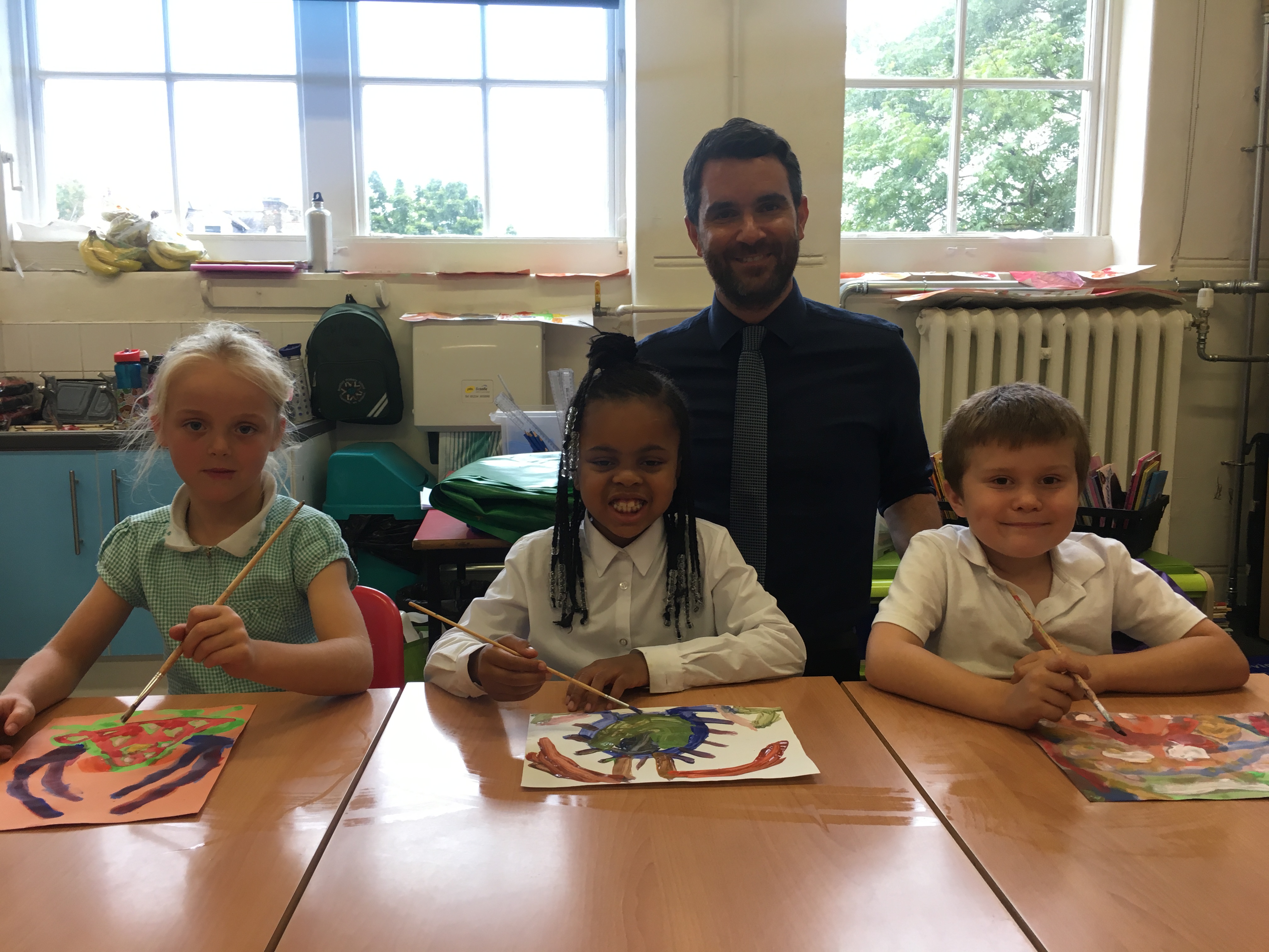 West Hampstead headteacher warns house prices exclude teachers Year 2 children Quinn, Desire and Tommy with Mr Drake