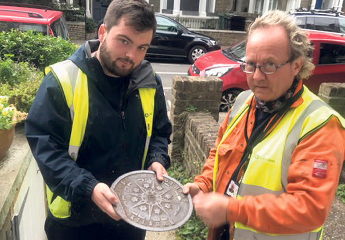 Manhole repairers Denis and Jack
