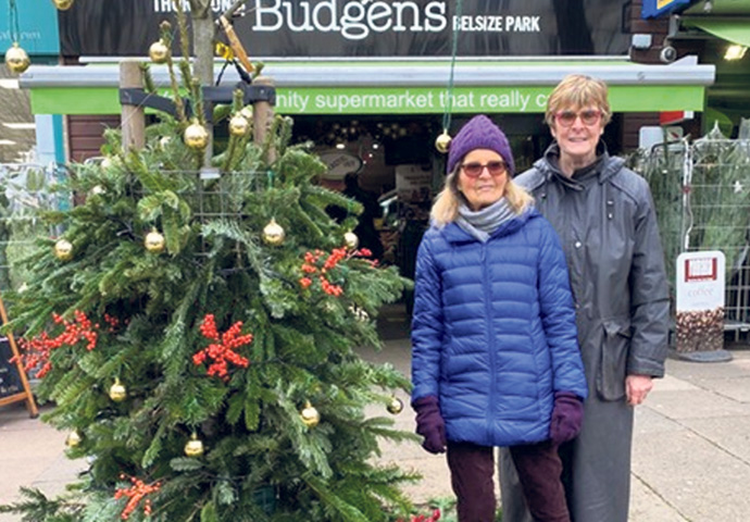 Shelly McKevitt and Linda Grove with tree for Nazanin
