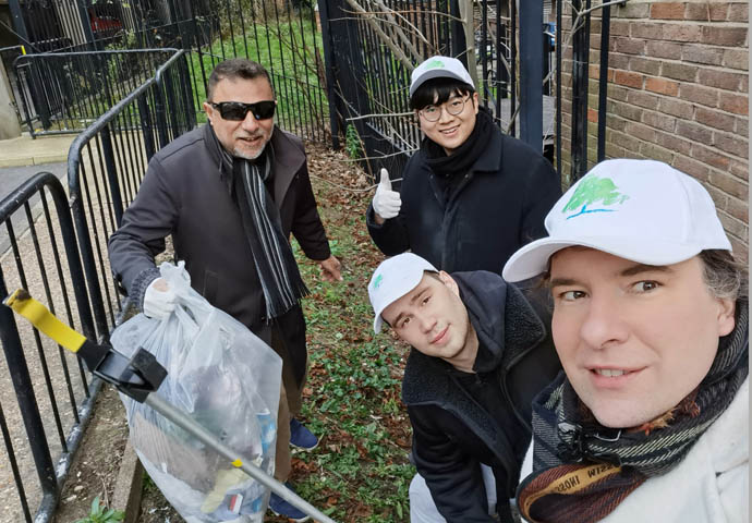 Marx de Morais with Calvin, Nic and Valeriy after cleaning up