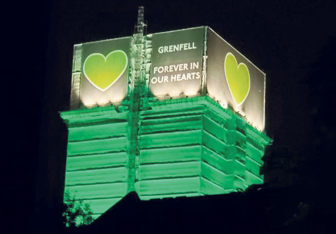 What exactly is the legal position on fire safety post Grenfell? Grenfell Tower in green light