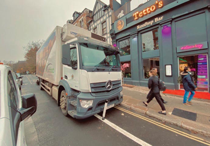 Act now before we have a ghost town Delivery driver and bike lane parking