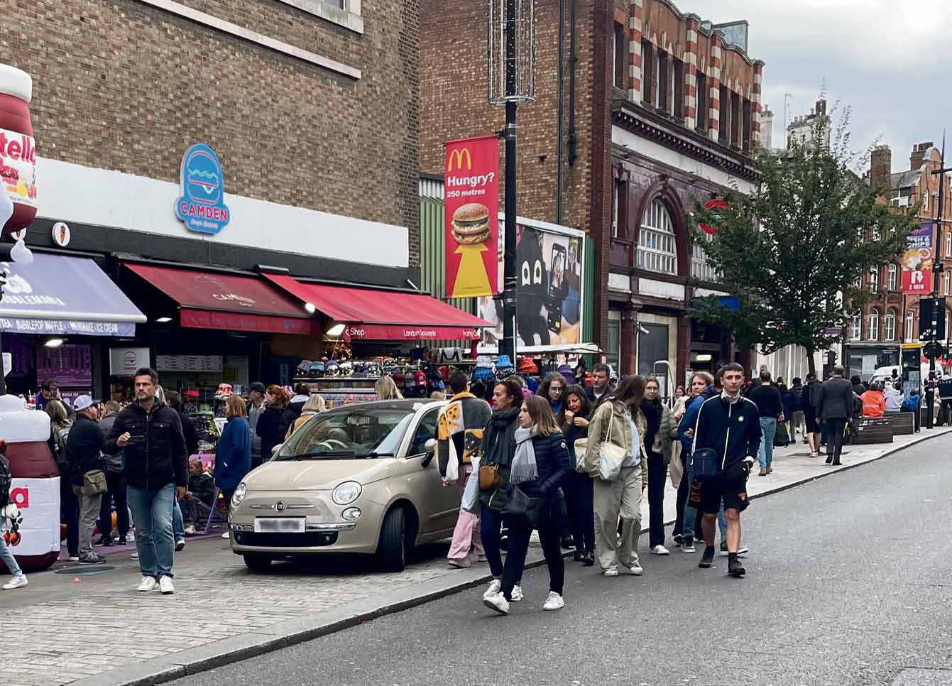 Camden Market clutter-cars parked on pavement 1