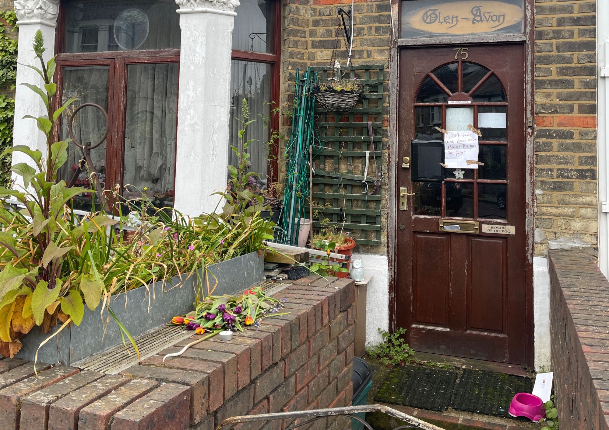 Flowers on West Hampstead doorstep and a toast for the neighbour who