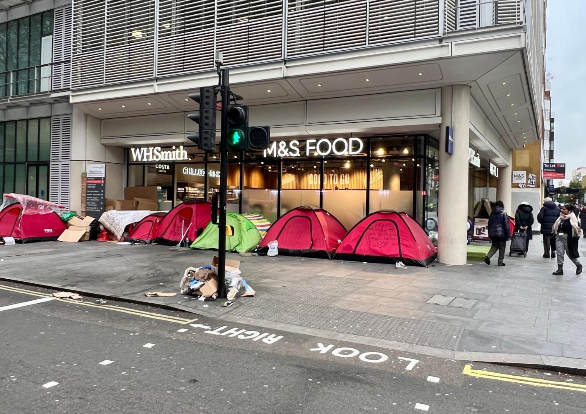 Homeless in tents say freezing weather support did not get to them Simon lam rock step