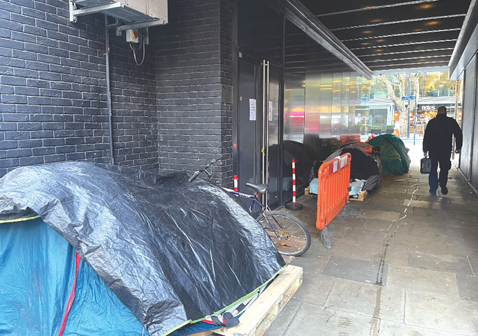 Rough sleepers told to pack up and move rough sleepers near Tottenham Court Road