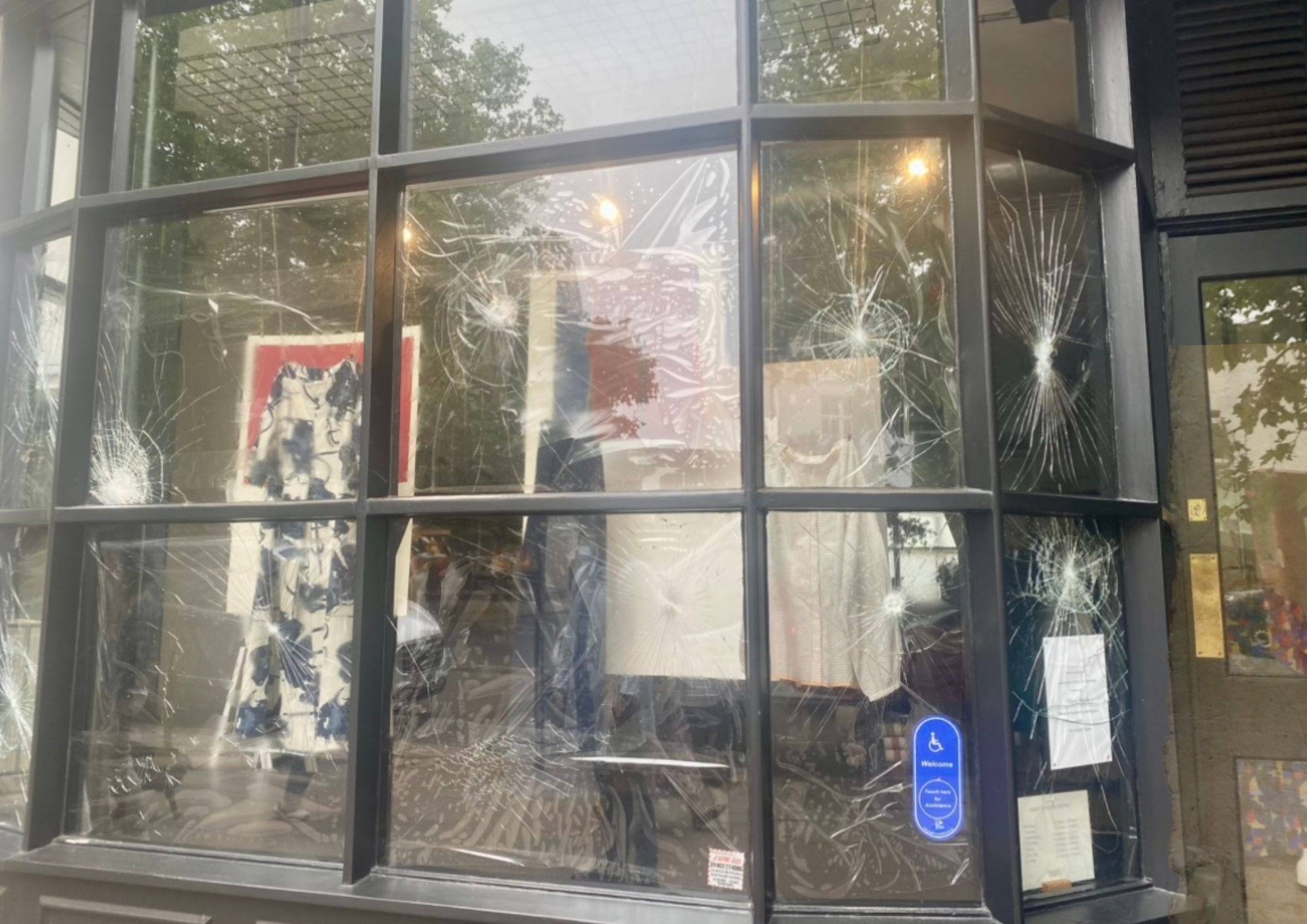Where are the police? More smashed windows in Hampstead High Street _(A4 (Landscape))