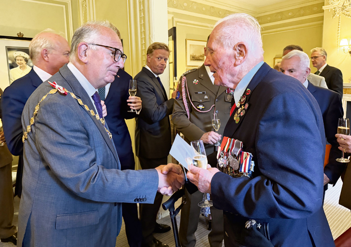Polish war veteran who saw D-Day action celebrates 102nd birthday Captain Eugeniusz Niedzielski and Mayor Dimoldenberg