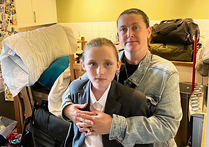 Family living in one room after sewage ordeal Rosa (L) and Denise (R) in kitchen post-sewage
