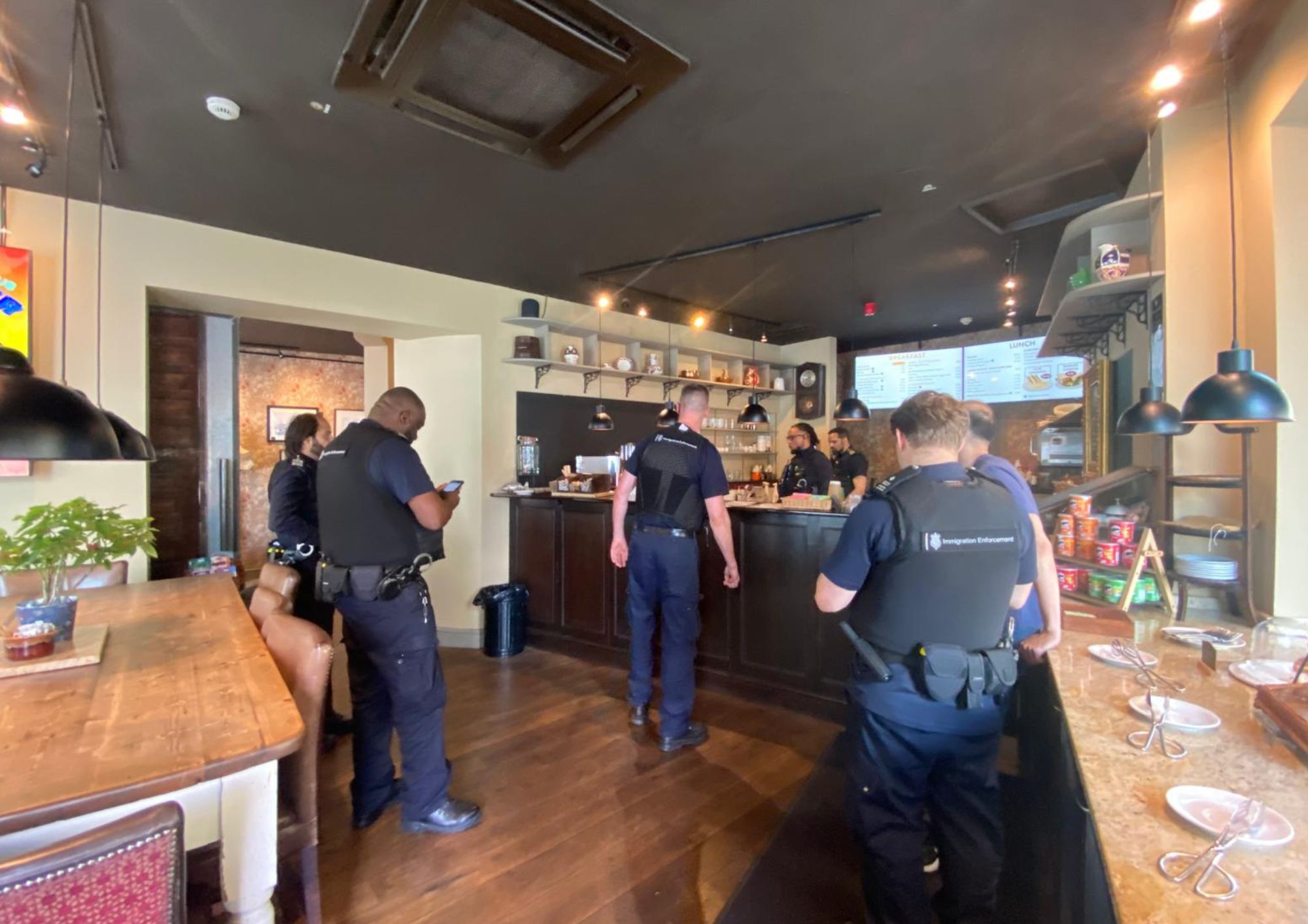ICE-style immigration raid on café was ‘overzealous’, claim onlookers raid (2)