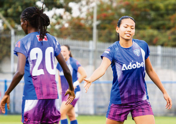 Striker Chan ‘loving life’ at Town Andrea Chan on the right PHOTO by Sophia Demetriades