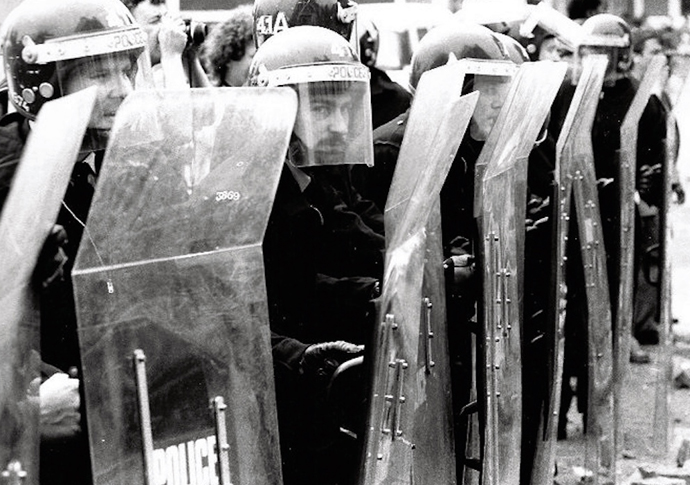 Police in riot gear at the Battle of Orgreave photo credit West Midlands Police_CC BY-SA 2